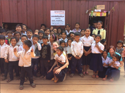 Students standing outside their new toilets in Chittagong, Bangladesh