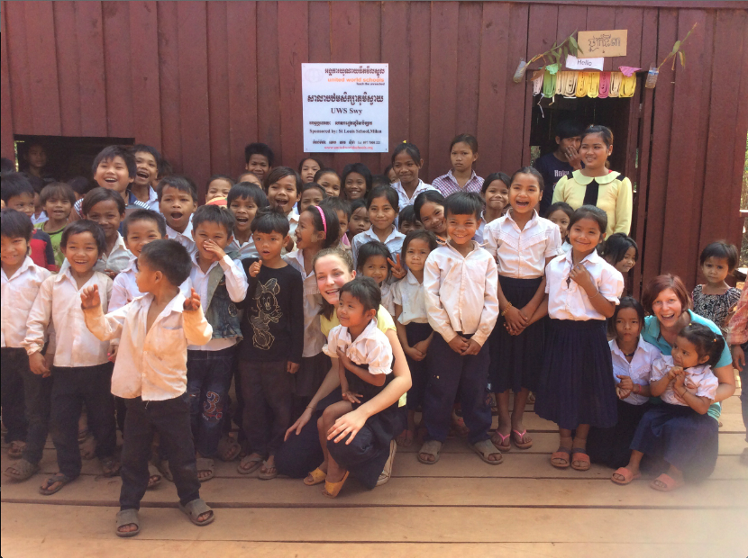 Students standing outside their new toilets in Chittagong, Bangladesh