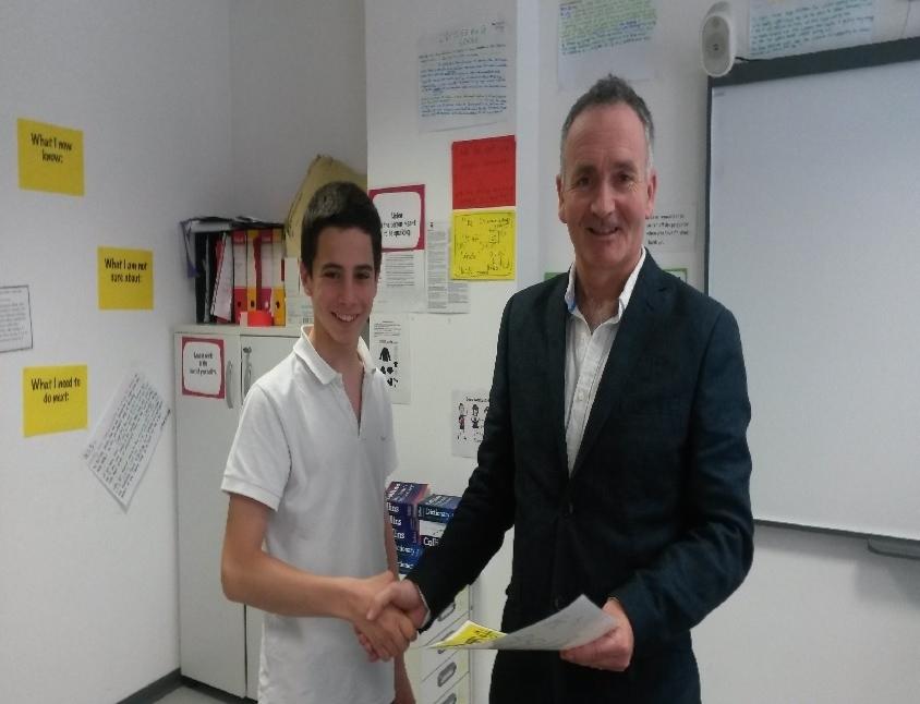 Ruggero receiving his certificate from Mr Rafferty