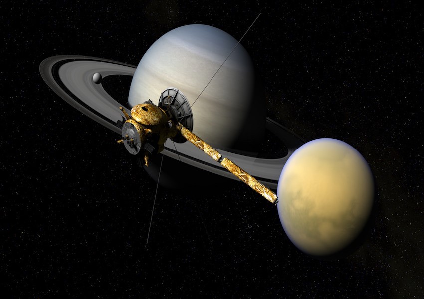 Cassini+moving+over+Titan%2C+Enceladus+and+Saturn